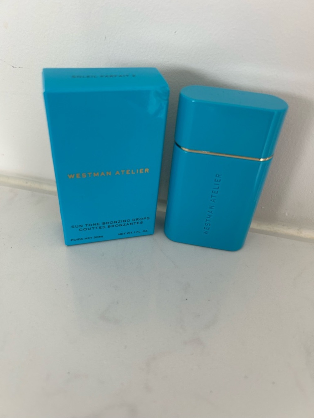 Westman Atelier Turquoise Sun Tone Bronzing Drops - Sleek Bottle